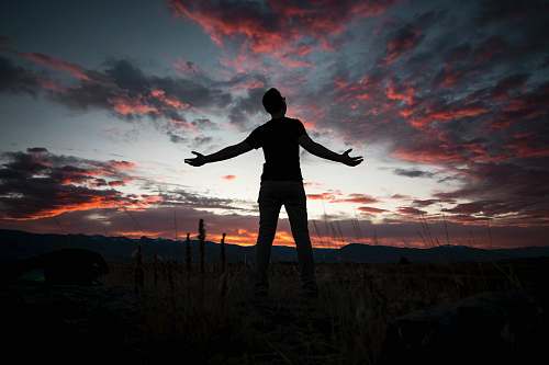 person silhouette of man under white and gray sky people