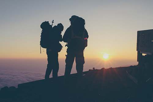 person silhouette of person standing on highgrounds people