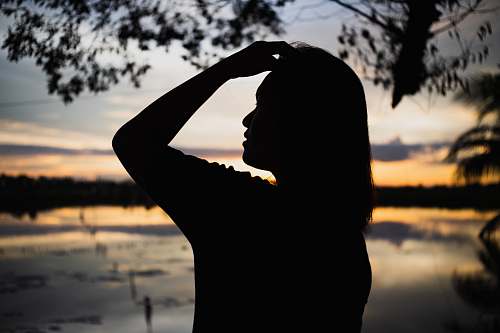 person silhouette photograph of woman silhouette