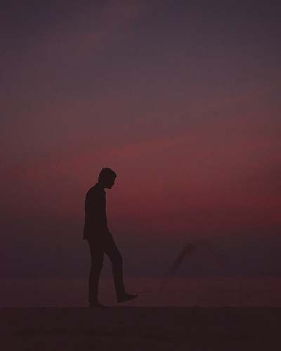 human man silhouette playing with sand person