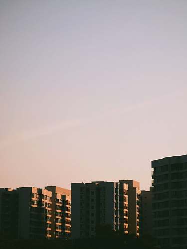 building mid-rise buildings during daytime office building