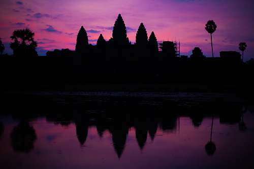 sunset silhouette of Ankor Wat silhouette