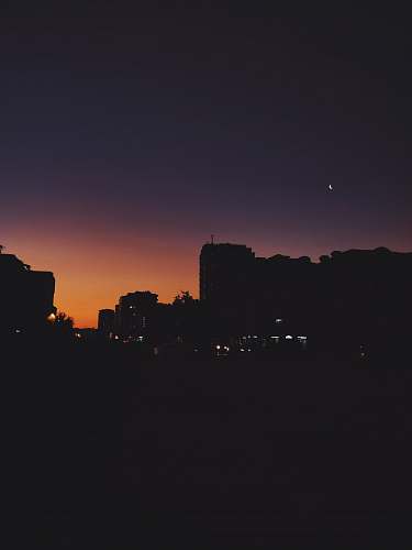 silhouette silhouette of high rise buildings outdoors