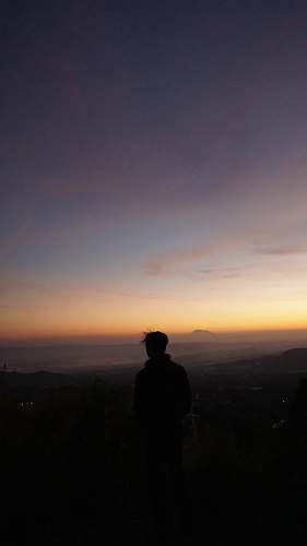 human silhouette of man outdoors