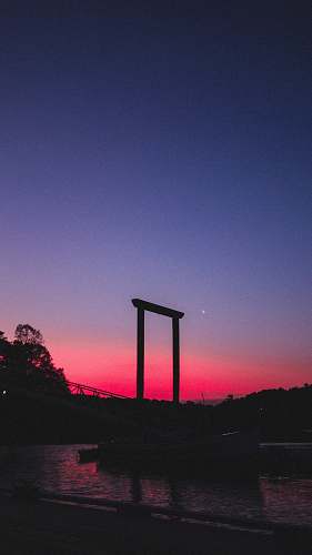 outdoors silhouette photography of gate dawn
