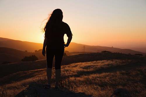 human silhouette photography unknown person standing outdoors person