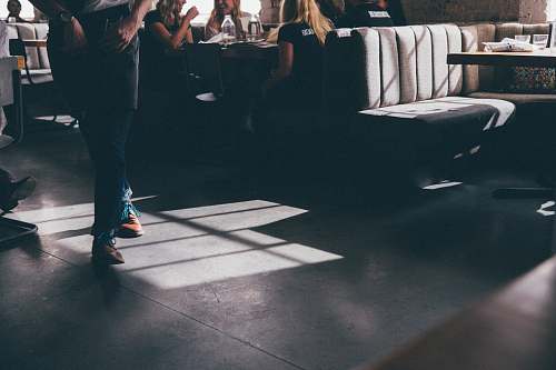 human person in pair of brown shoes indoor person