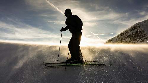 person silhouette of man doing ski human