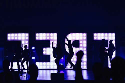 silhouette silhouette of people with free marquee letters music
