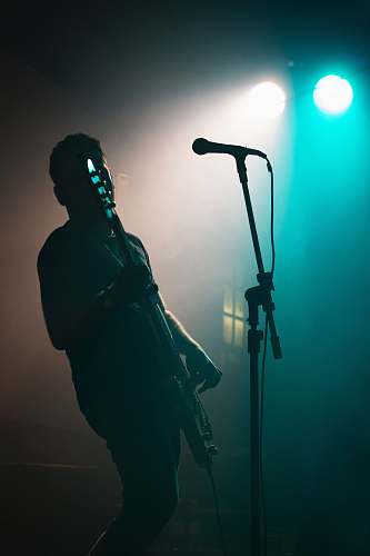 music man holding electric guitar human