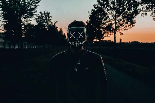 silhouette man on road during golden hour nature