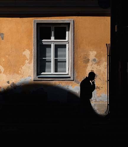 people man passing by the window window