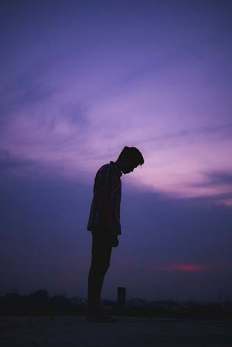 human man standing on ground standing