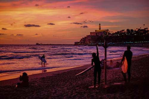 human people holding surfboard people