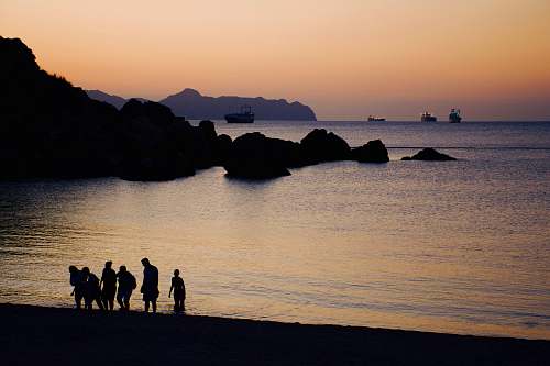 silhouette people on beach human