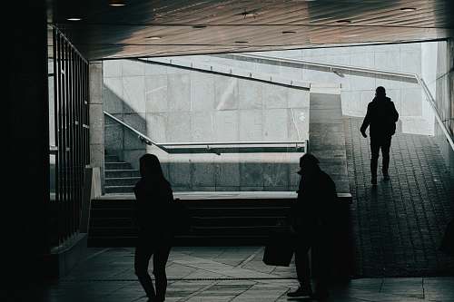 human people walking in dark building pedestrian