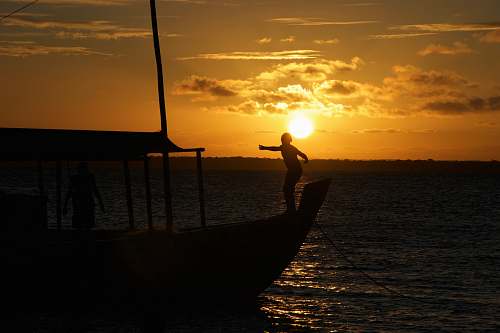 human person on boat sunlight