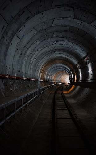 tunnel photo of train rail tunnel track