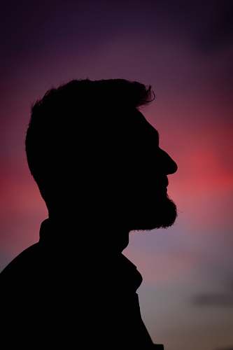 silhouette silhouette of man during dusk human