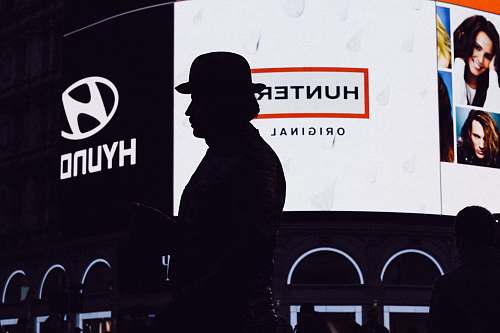 people silhouette of man on screen projector human
