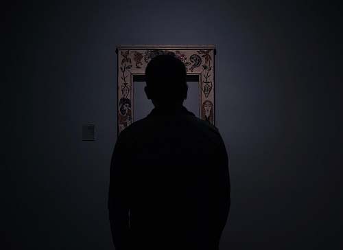 human silhouette of person facing an empty photo frame barcelona