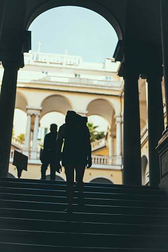 human silhouette of person standing on stairs people