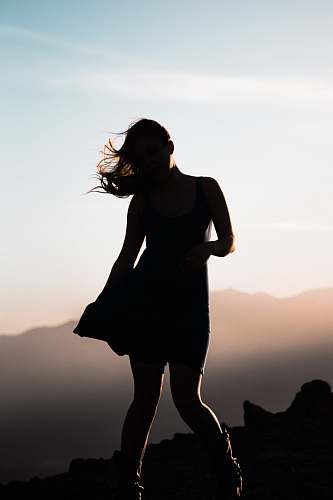 people silhouette of woman on hill top view human