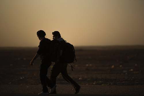 human two men walking silhouette