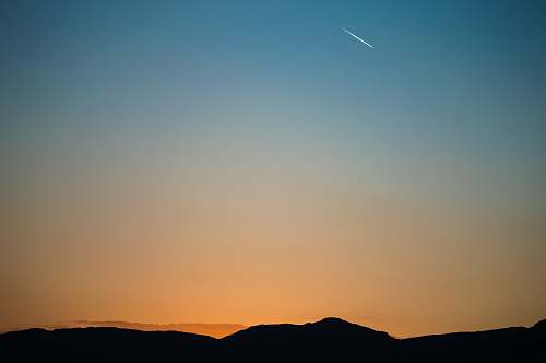 sky landscape photography of comet sunrise