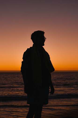 nature man standing near shore outdoors