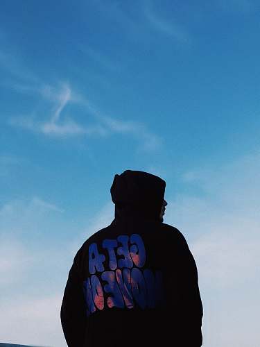 apparel man wearing black pullover hoodie clothing