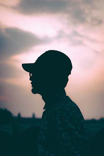apparel man wearing cap clothing