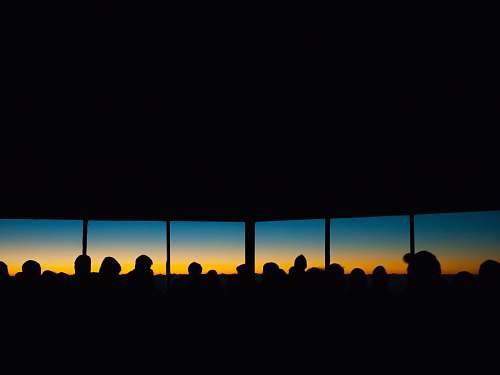 sunset people inside building sunrise