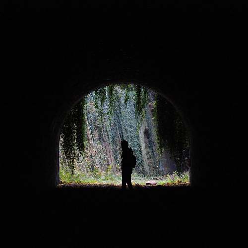 person person standing in tunnel human