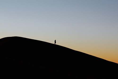 morocco person standing on cliff hill