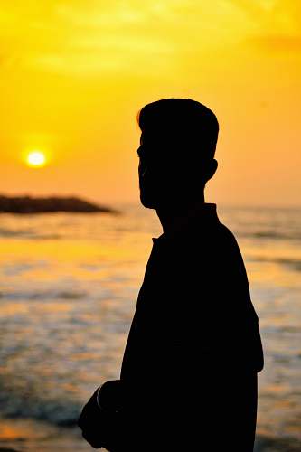 nature silhouette man standing near sea human