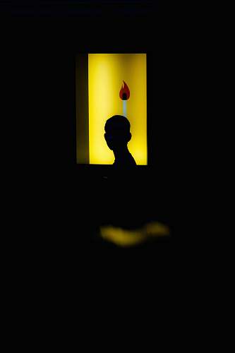 human silhouette of human toward with lighted room photography person