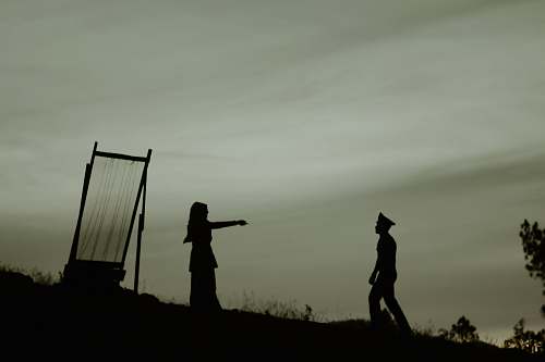 human silhouette of man and woman grey