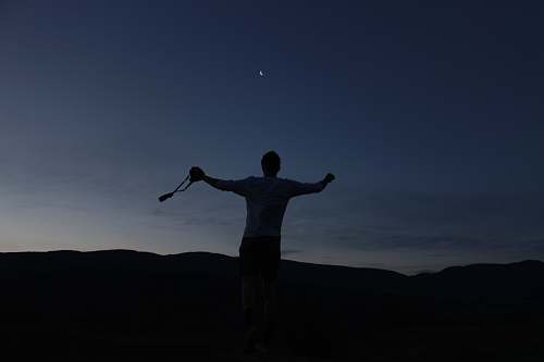 person silhouette of man jumping up human