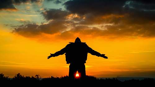 nature silhouette of man spreading its arm dinnington