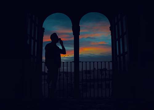 human silhouette of man standing on terrace person