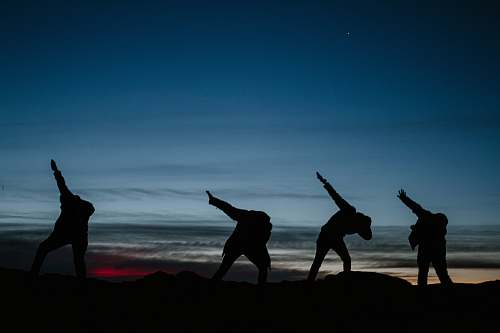 human silhouette of men under blue sky person