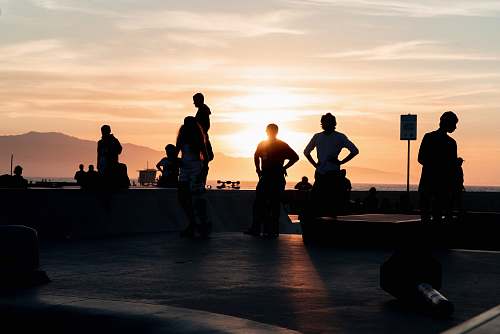 human silhouette of people at the skate ramp person