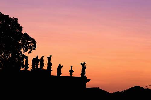 nature silhouette of people on top of mountain sunset