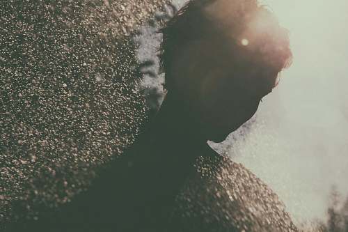 grey silhouette of person rain