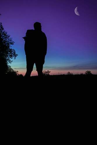 human silhouette of person on grass person