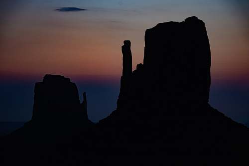 dawn silhouette of rock formation dusk