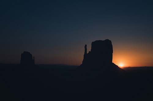 sunset silhouette of rocks sunrise