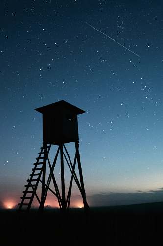 tower silhouette of shed during night załuki