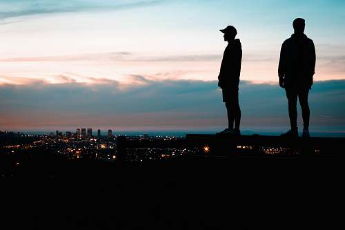 human silhouette of two men standing person